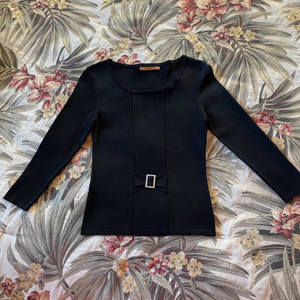 Black sweater with rhinestone buckle at waist